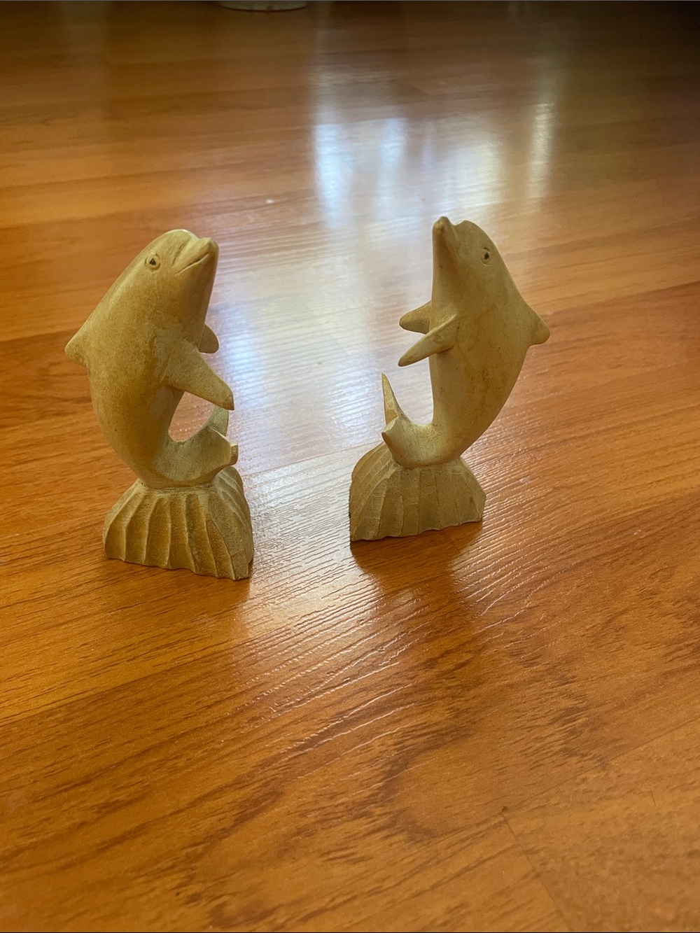 Pair of hand crafted dolphins